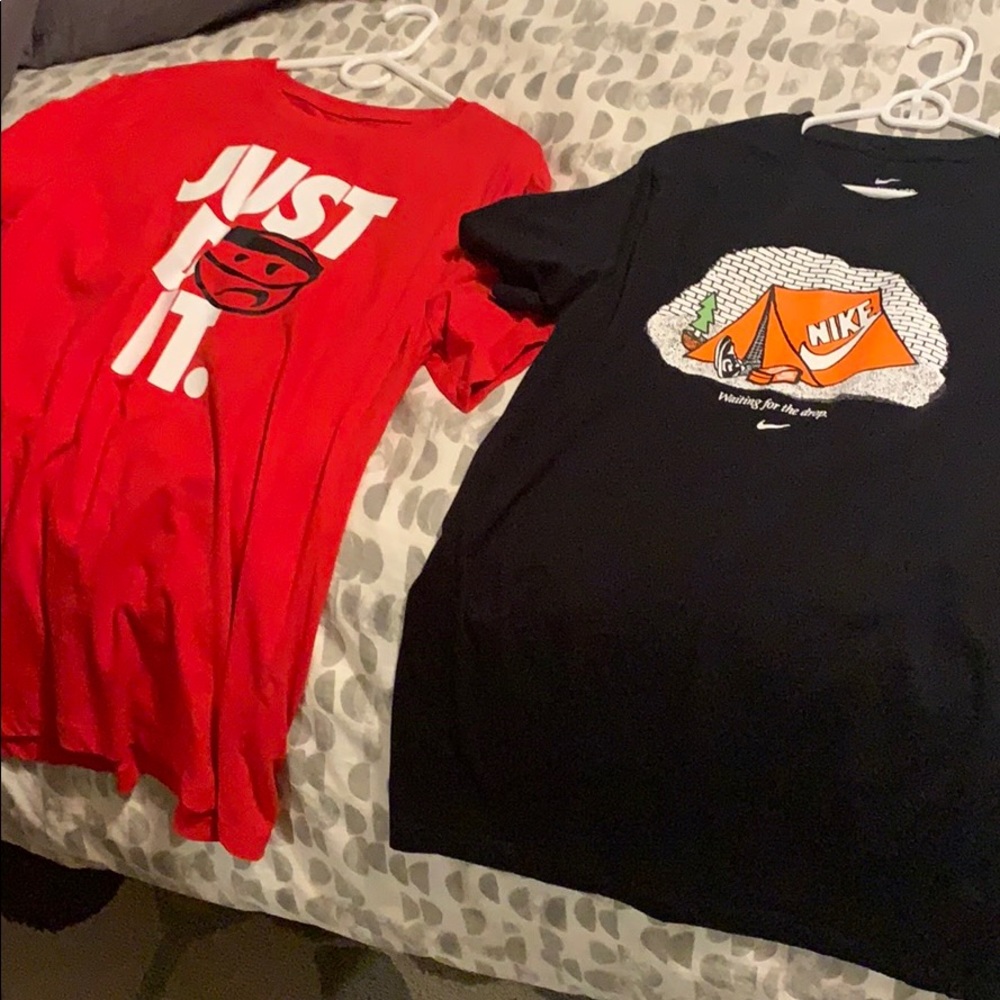 2 nike t shirts never worn, no tag.